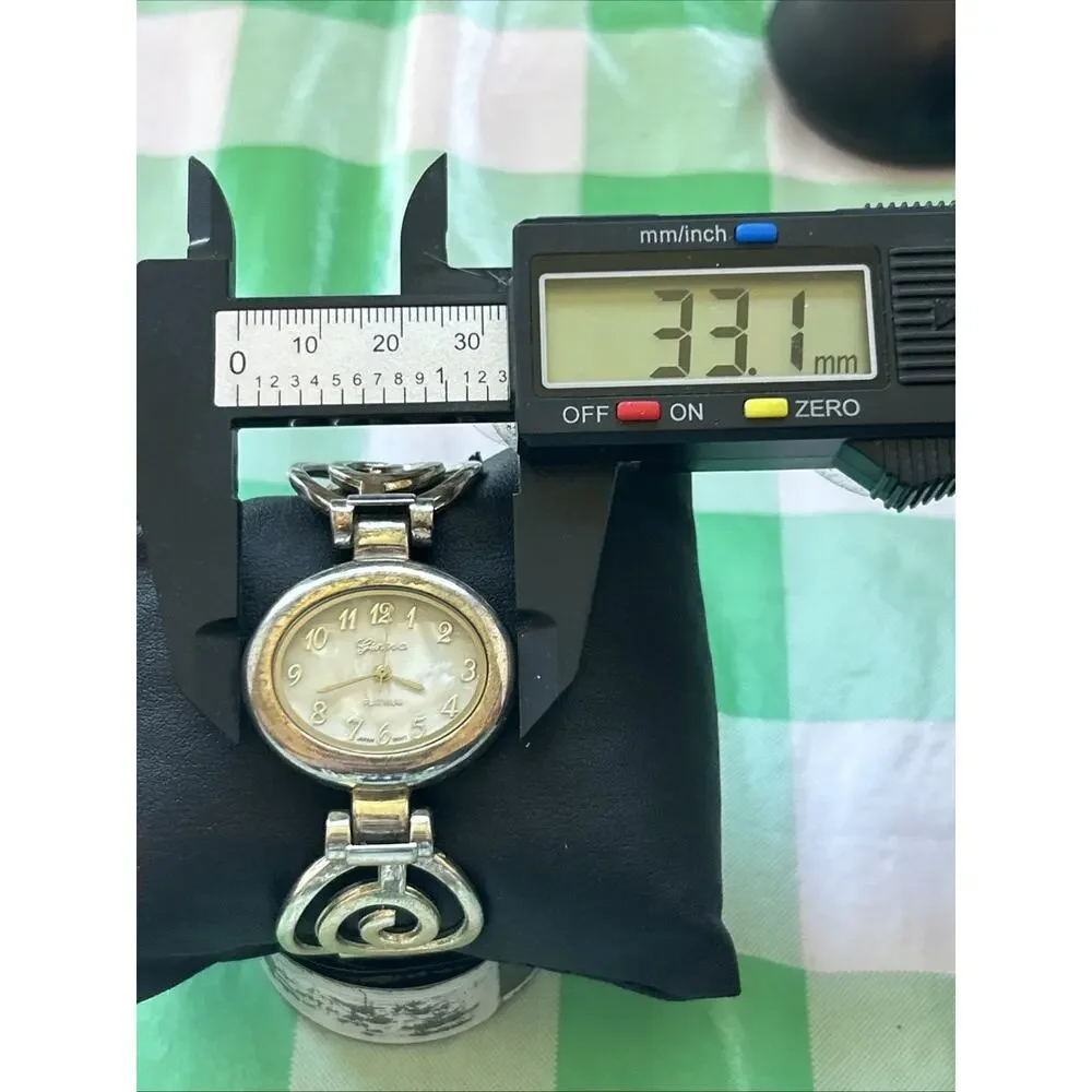 Geneva Silver Tone Women’s Quartz Cuff Watch
